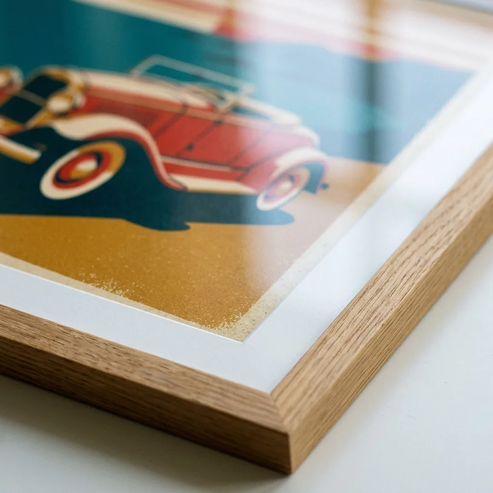 Mitred corner of a natural oak frame with white mount